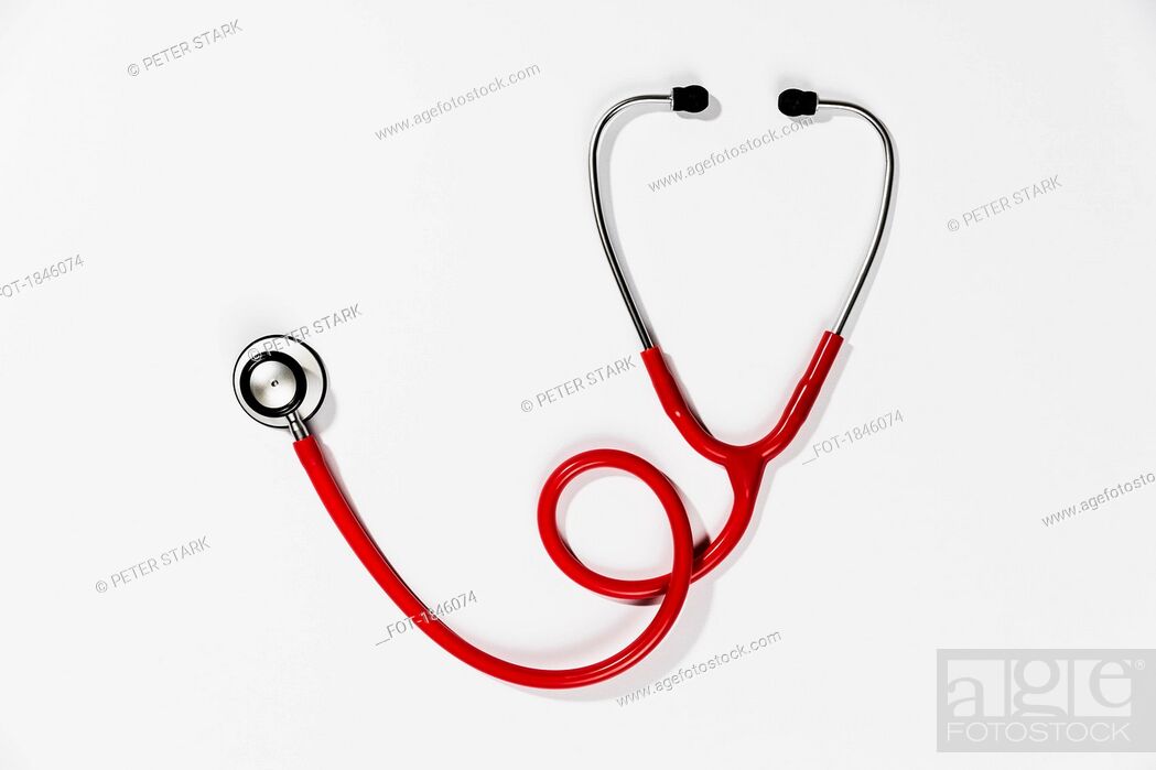 Stock Photo: Red stethoscope on white background.