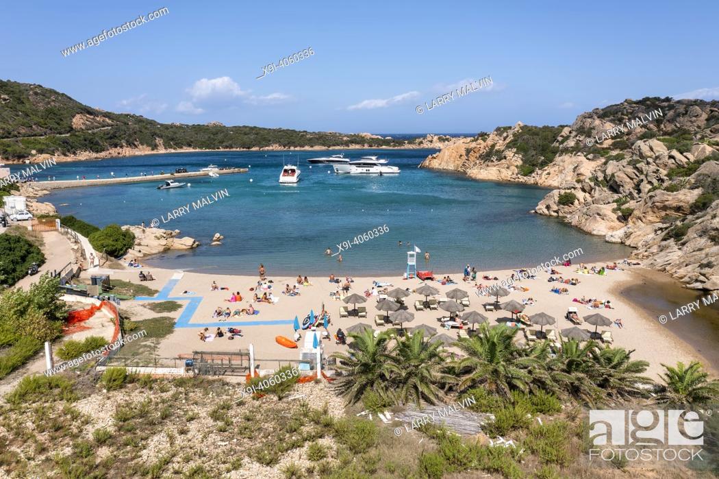 Stock Photo: Aerial view of Spiaggia di Cala Spalmatore, a relaxed swimming, snorkeling & boating area with clear waters backed by cliffs on the island of La Maddelena in.