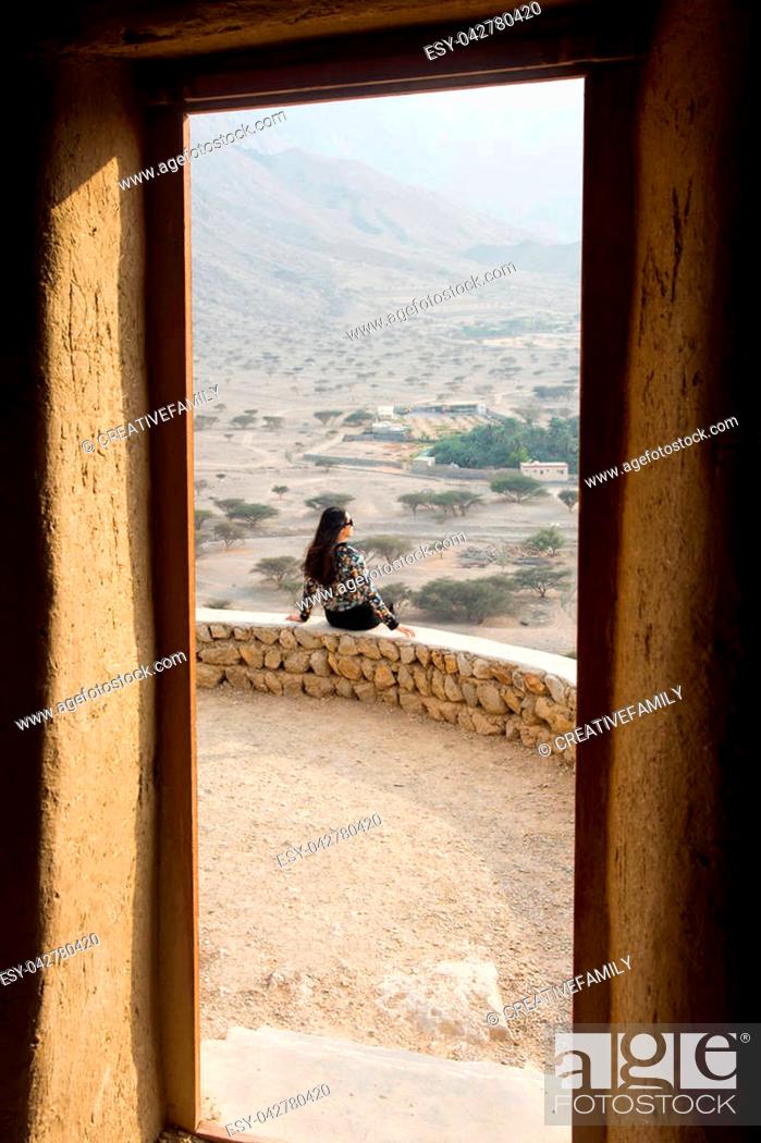 Stock Photo: Girl enjoying scenery on a hiking trip.