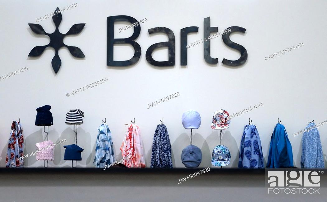 Stock Photo: Cap, scarves and handkerchiefs by Dutch label Barts are on display at 'Bread & Butter' at former Tempelhof Airport at in Berlin,  Germany, 08 July 2014.