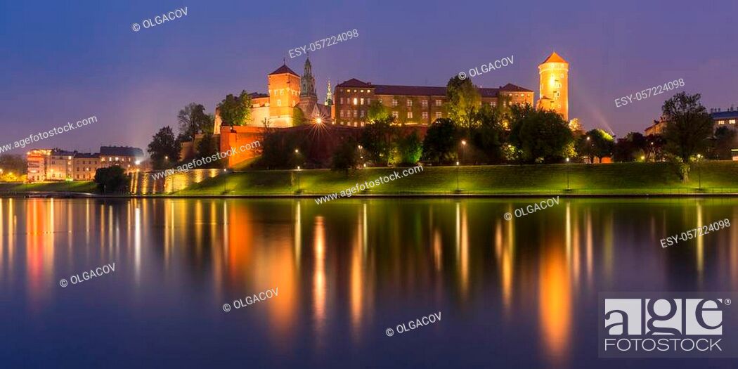 Stock Photo: Panorama of Wawel Castle on Wawel Hill with reflection in the river at night as seen from the Vistula, Krakow, Poland.
