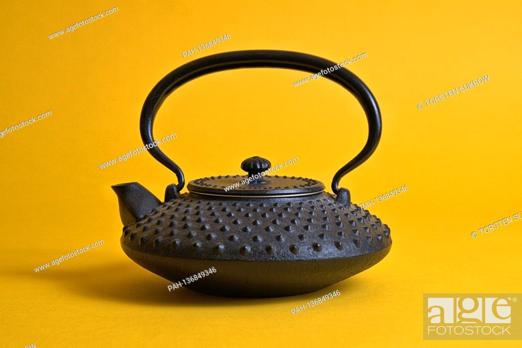 Stock Photo: A small original Iwachu cast iron teapot from Japan with the so-called, hail pattern (Arare), here in smaller size (Chu-Arare).