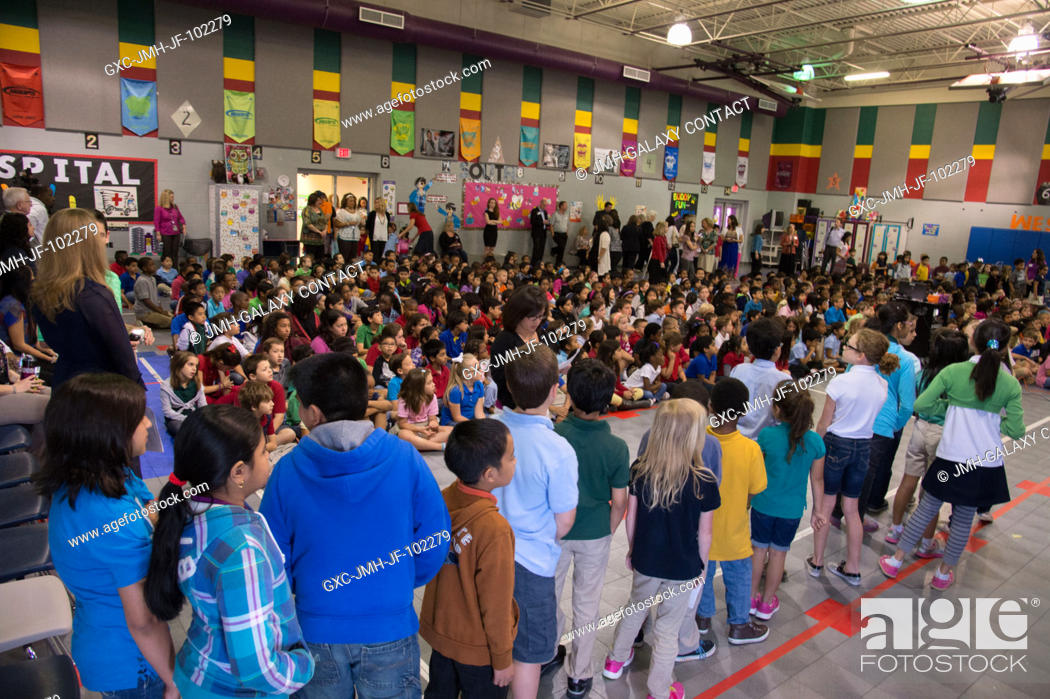 Stock Photo: Students at Mary Marek Elementary School in Pearland, Texas speak with Expedition 35 crew members and NASA astronauts Tom Marshburn and Chris Cassidy aboard the.