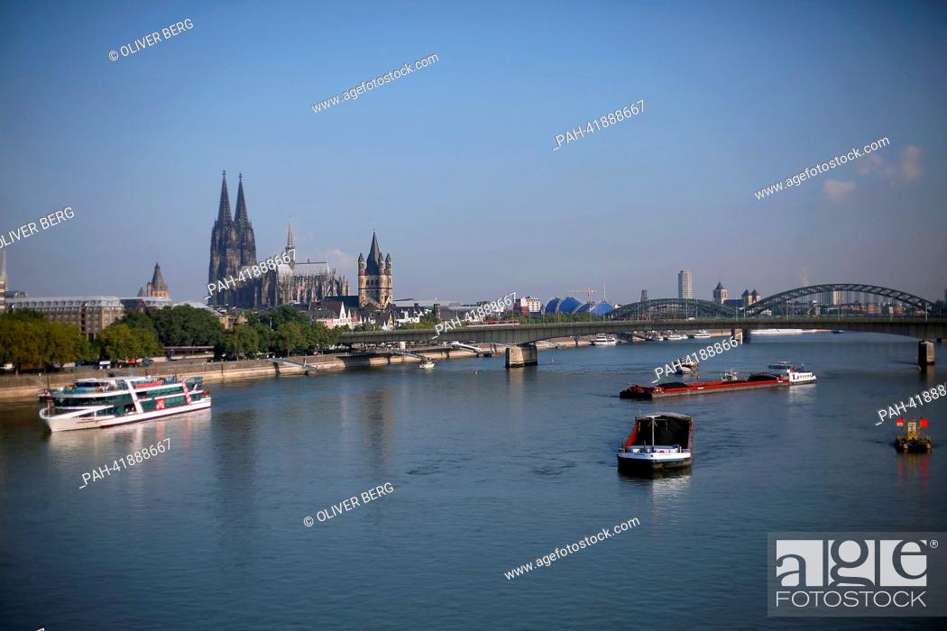 Stock Photo: Two parts of a combination of a push boat and barges (R) have run aground in the Rhine in Cologne, Germany, 20 August 2013.