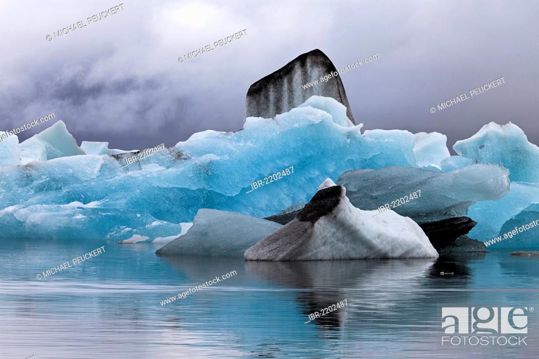 Stock Photo: Small icebergs with traces of volcanic ash in the Joekulsarlon glacial lagoon of the Vatnajoekull Glacier, Iceland, Europe.