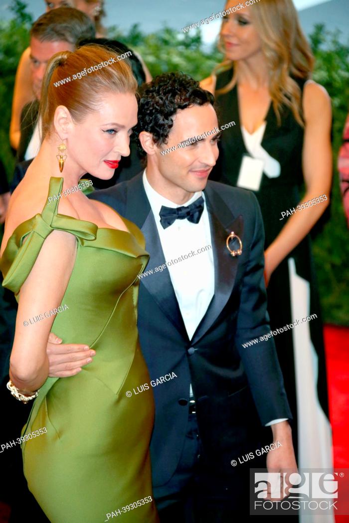 Stock Photo: Actress Uma Thurman and designer Zac Posen arrive at the Costume Institute Gala for the ""Punk: Chaos to Couture"" exhibition at the Metropolitan Museum of Art.