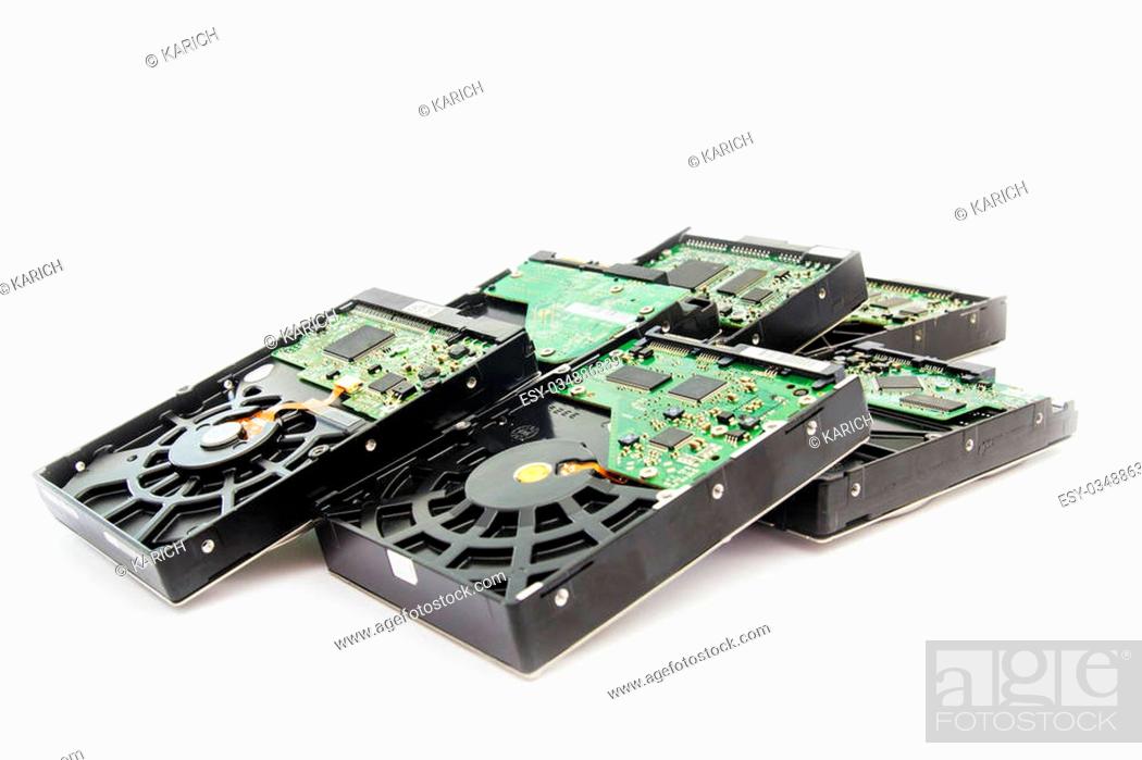 Stock Photo: Stack of Old SATA and ATA Hard Disk Drives. Isolated on White Background.
