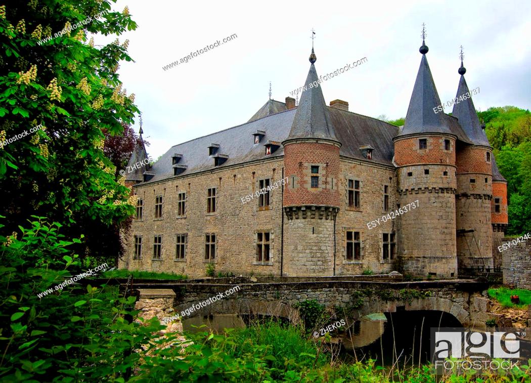 Stock Photo: Old Belgium Castle Château de Spontin on Cloudy Sky background in Summer Day Outdoors.
