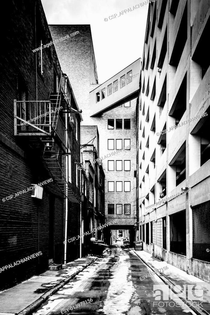 Stock Photo: Narrow alley and parking garage in Baltimore, Maryland.