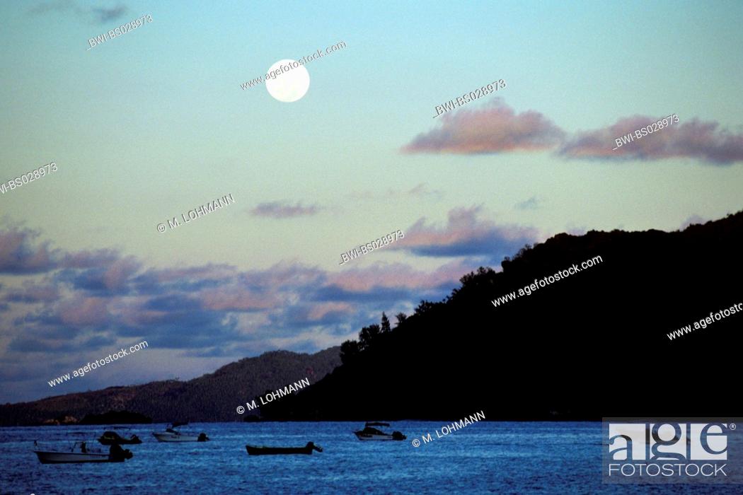 Stock Photo: moon above the coast, Seychelles, Praslin.