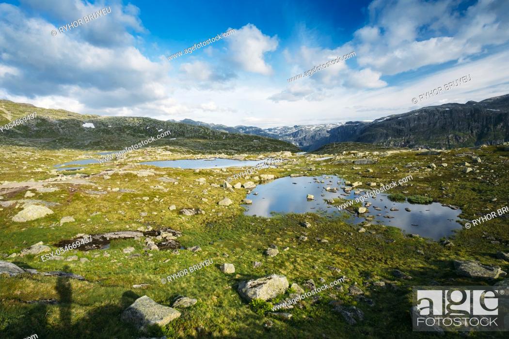 Stock Photo: Beautiful Norwegian Mountains and Blue Deep Lake. Nature of Norway. Travel and Hiking. Amazing Scenic View. Nobody. Scandinavia.