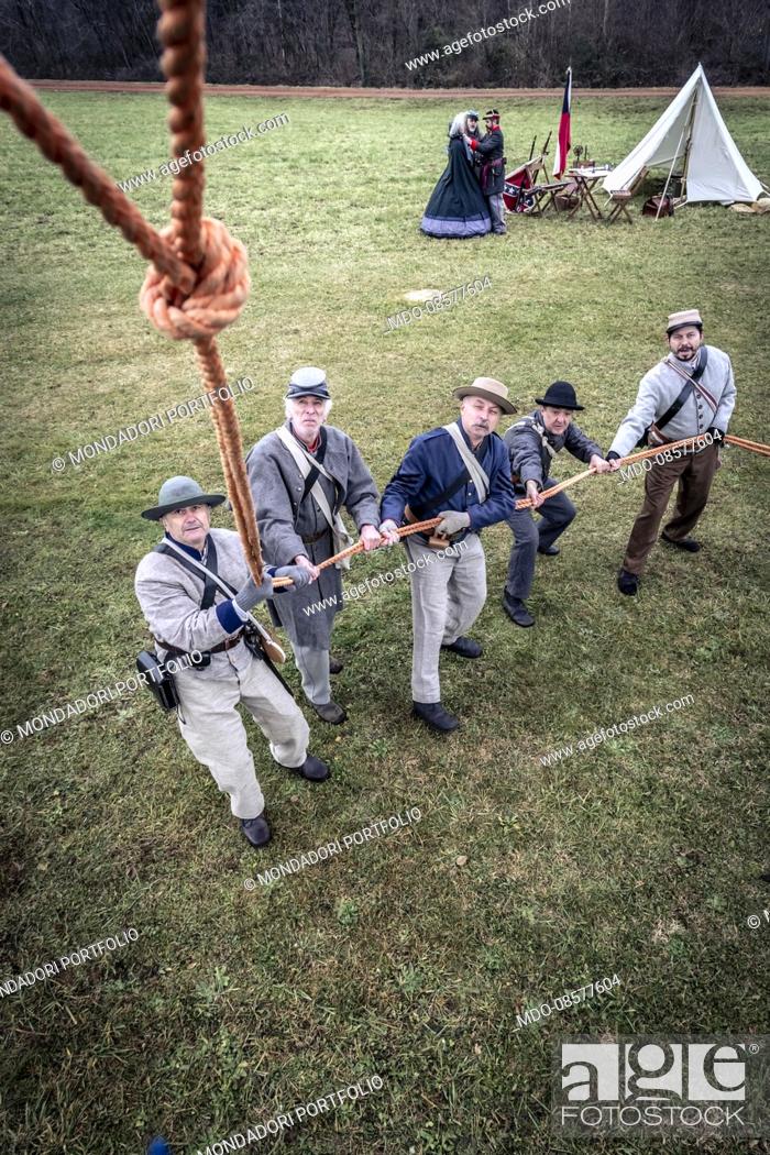 Stock Photo: American Civil War, Confederate Army. Intelligence Unit with hot-air balloon. Confederate soldiers guiding a hot-air balloon by pulling a rope.