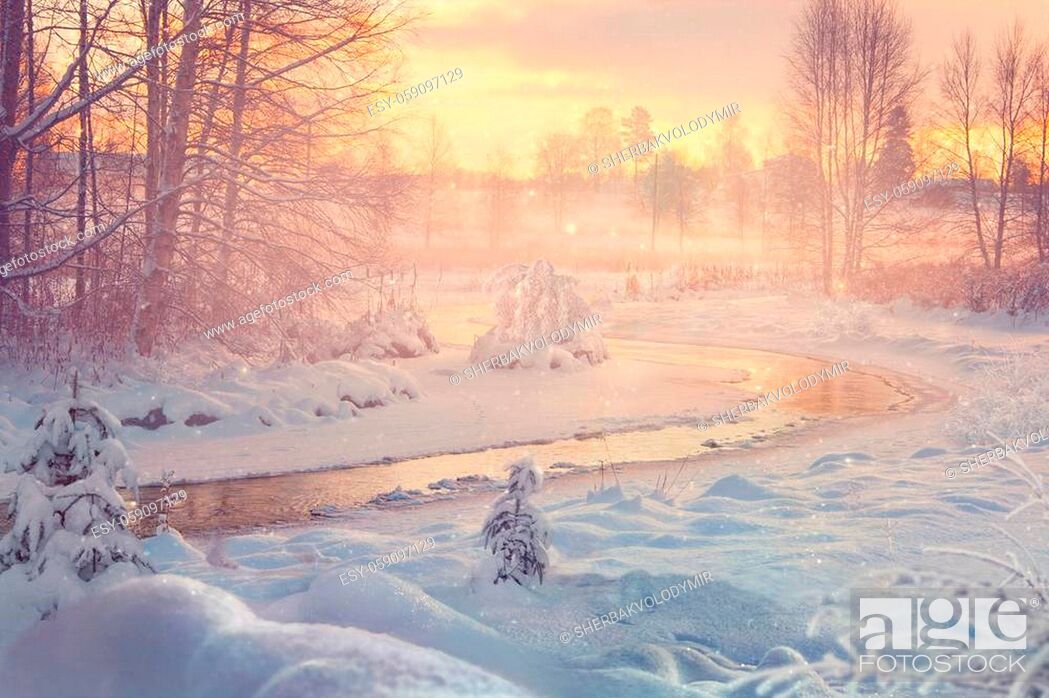 Stock Photo: small river in winter, with sunbeams filtering through bare birch trees. dawn or dusk.