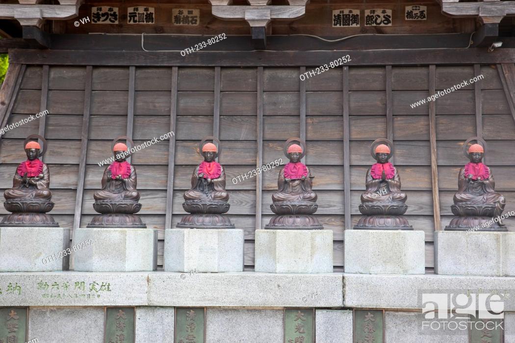 Stock Photo: The stone statue of Jizo on he belfry, Kitamuki Kannon temple complex, Bessho Onsen, Ueda city, Nagano prefecture, Japan.