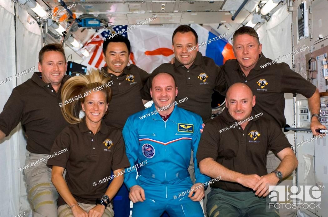 Stock Photo: STS-124 crewmembers pose for a portrait following a joint news conference with the Expedition 17 crewmembers from the Kibo Japanese Pressurized Module of the.