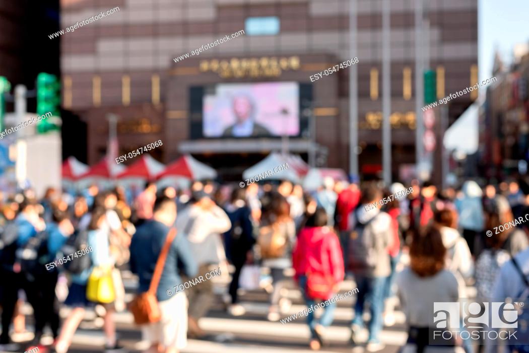 Stock Photo: blurred abstract people and car moved at city center at Taipei.