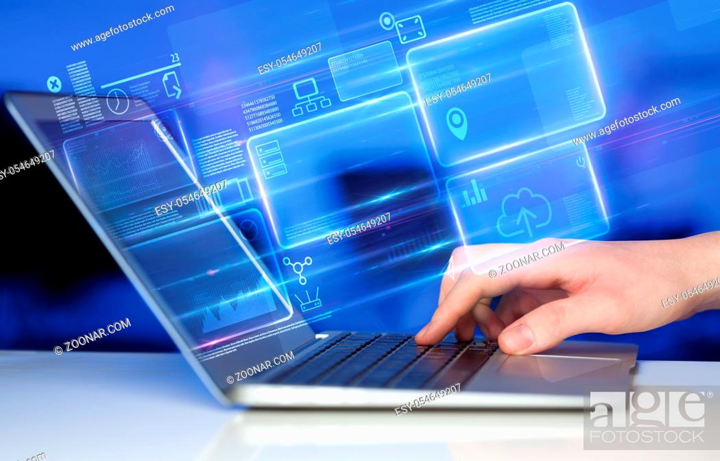 Stock Photo: Hand using laptop with database reports and online work concept.