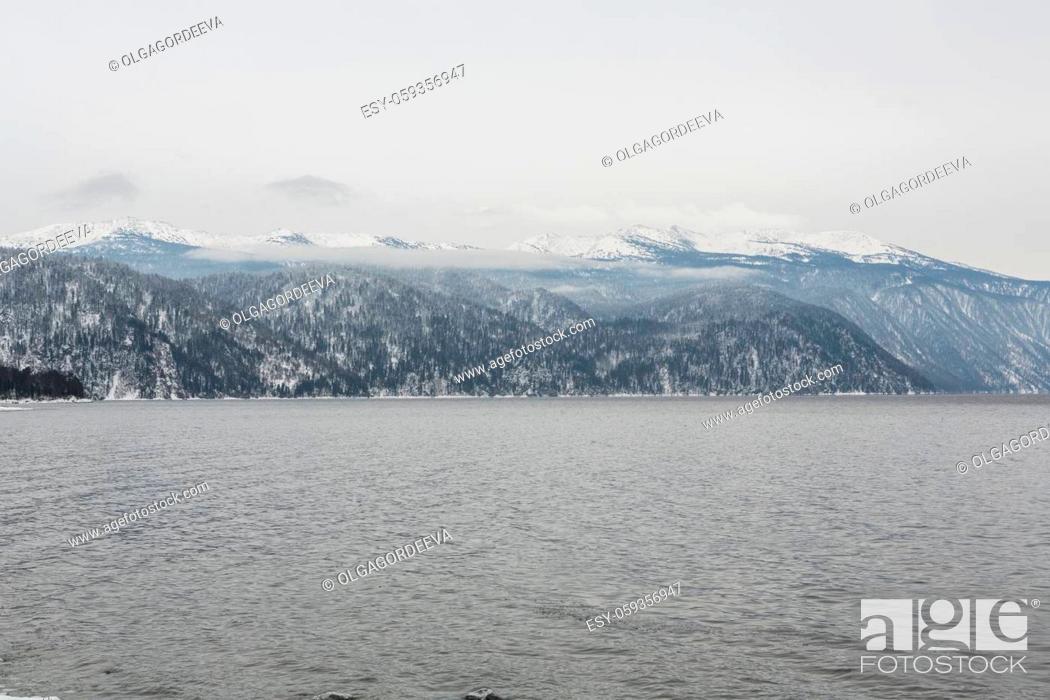 Stock Photo: unfrozen Lake Teletskoye in winter. Russia Altai Krai.