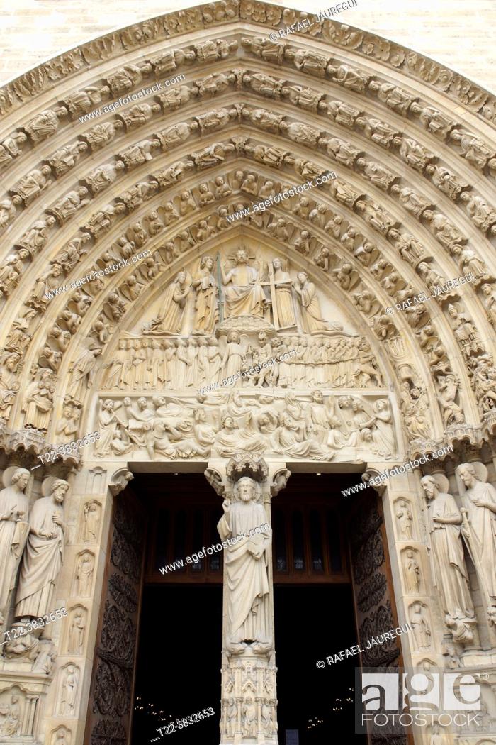 Stock Photo: Paris (France). Architectural detail of one of the doors of the west facade of the Cathedral of Notre Dame in the city of Paris.