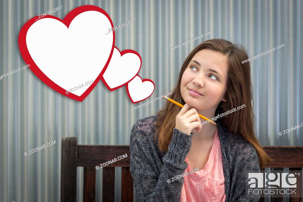 Stock Photo: Cute Daydreaming Girl With Blank Floating Hearts Clipping Path Included.