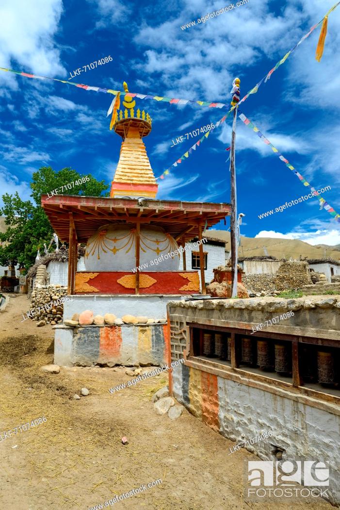 Stock Photo: Prayer wheels and stupa in Ghami, Ghemi, tibetian village with a buddhist Gompa at the Kali Gandaki valley, the deepest valley in the world.