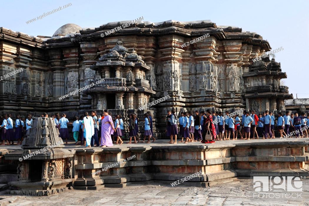 Stock Photo: India, South India, Belur, Tourist at chennakesava temple.