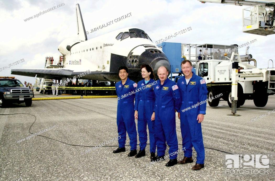 Stock Photo: Astronauts Dominic L. Gorie (right) and Mark E. Kelly, STS-108 mission commander and pilot, respectively, Linda M. Godwin and Daniel M.