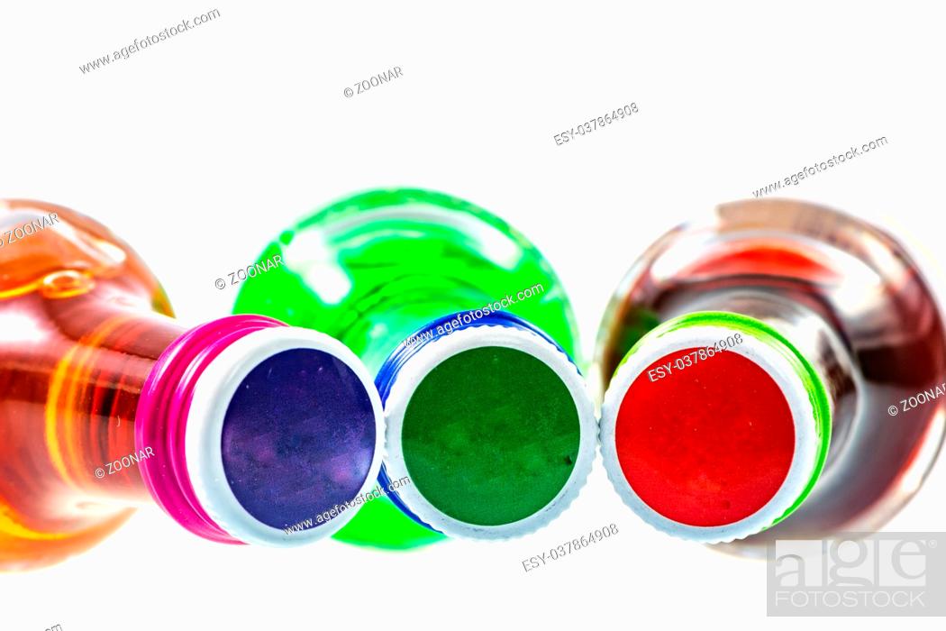 Stock Photo: Various isolated liqueur bottles with party drinks.