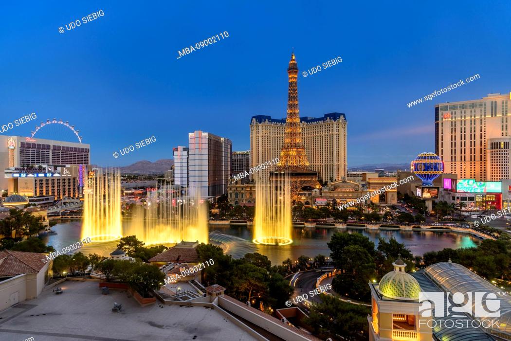 Stock Photo: USA, Nevada, Clark County, Las Vegas, Las Vegas Boulevard, The Strip, Hotel Bellagio, Fountains of Bellagio vs. Ballys and Paris Las Vegas with Eiffel Tower.