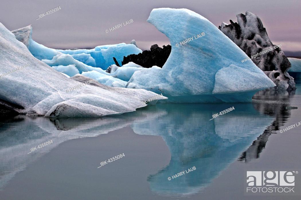 Stock Photo: Ice, icebergs with traces of volcanic ash, glacier, glacial lake of the Vatnajökull glacier, Jökulsarlon, Iceland.