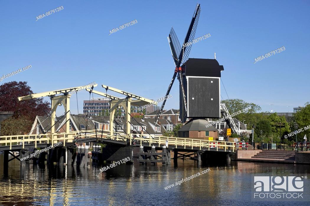 Stock Photo: Rembrandt Bridge at Galgewater with Molen de Put in Leiden, South Holland, Netherlands.