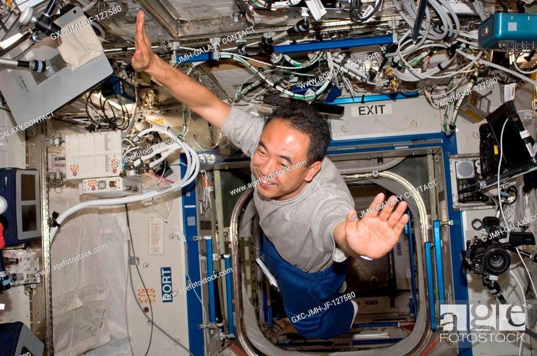 Stock Photo: Japan Aerospace Exploration Agency astronaut Satoshi Furukawa, Expedition 28 flight engineer, is pictured floating freely in the Destiny laboratory of the.