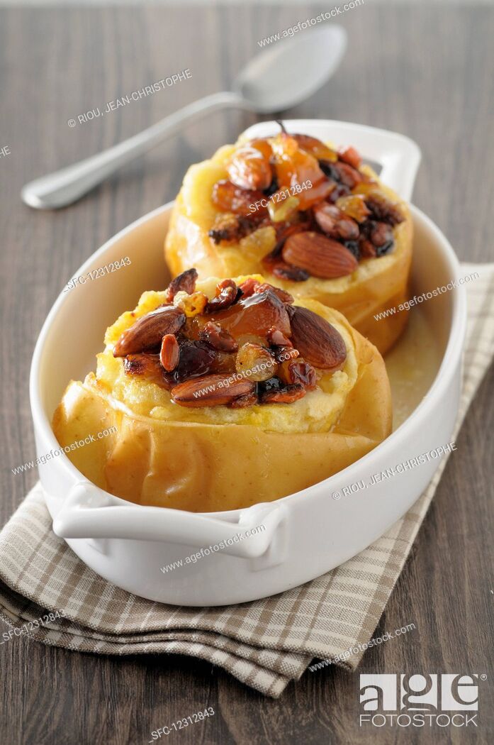Stock Photo: Baked apples with raisins and almonds.