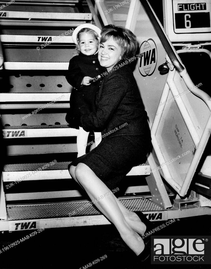 Stock Photo: Sep. 25, 1961 - New York, NY, U.S. - American actress EDIE ADAMS with her two year old daughter MIA, is shown arriving via TWA Superjet to spend two weeks in.