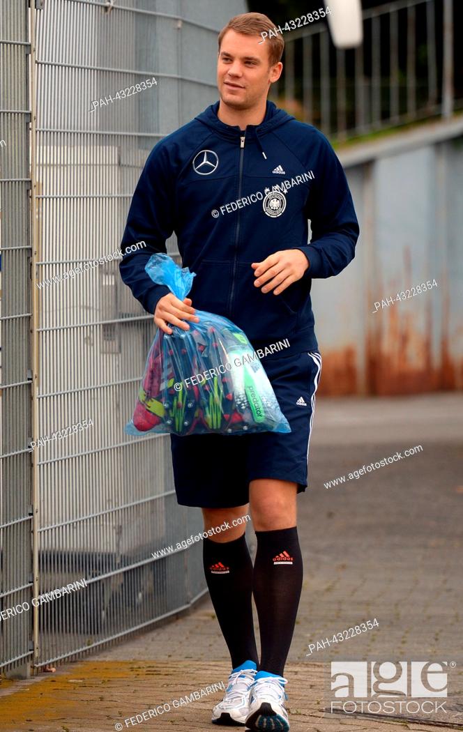 Stock Photo: Germany's goalkeeper Manuel Neuer arrives for the training session of the German national soccer team in Duesseldorf, Germany, 08 October 2013.