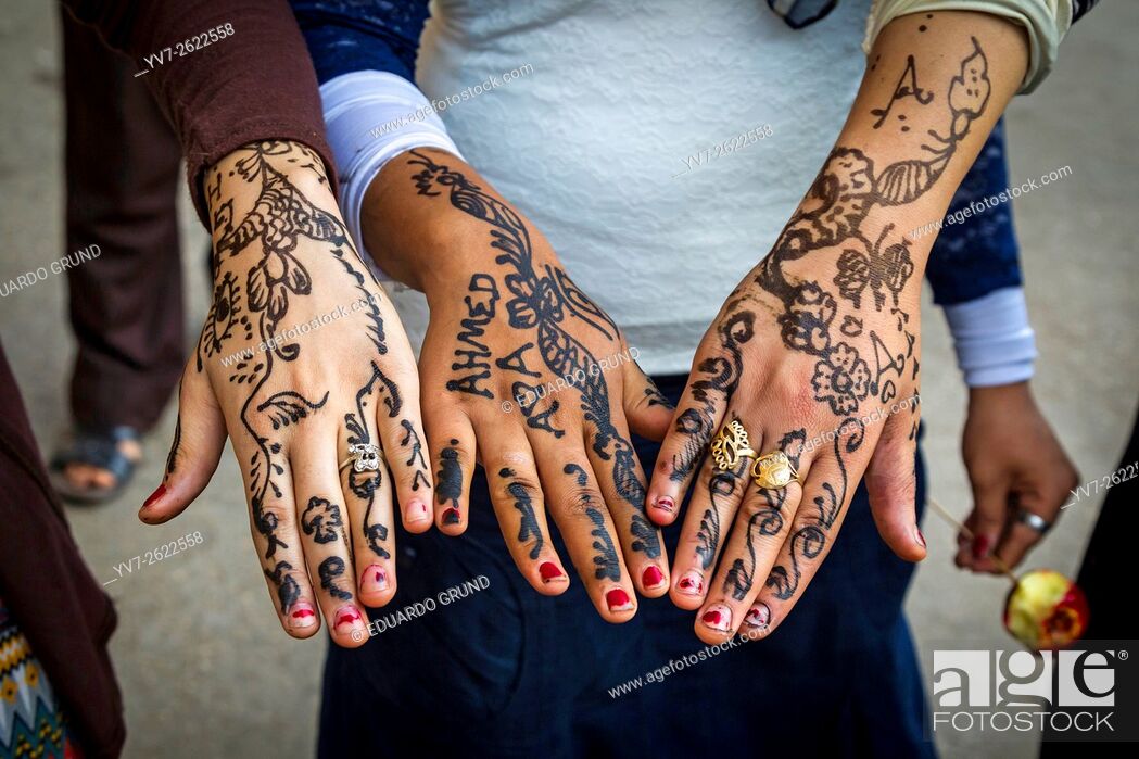 Stock Photo: Hands decorated with henna. Mosque of Al Hussein Sayyidna next to the market Khan al-Khalili. Cairo. Cairo, Egypt.