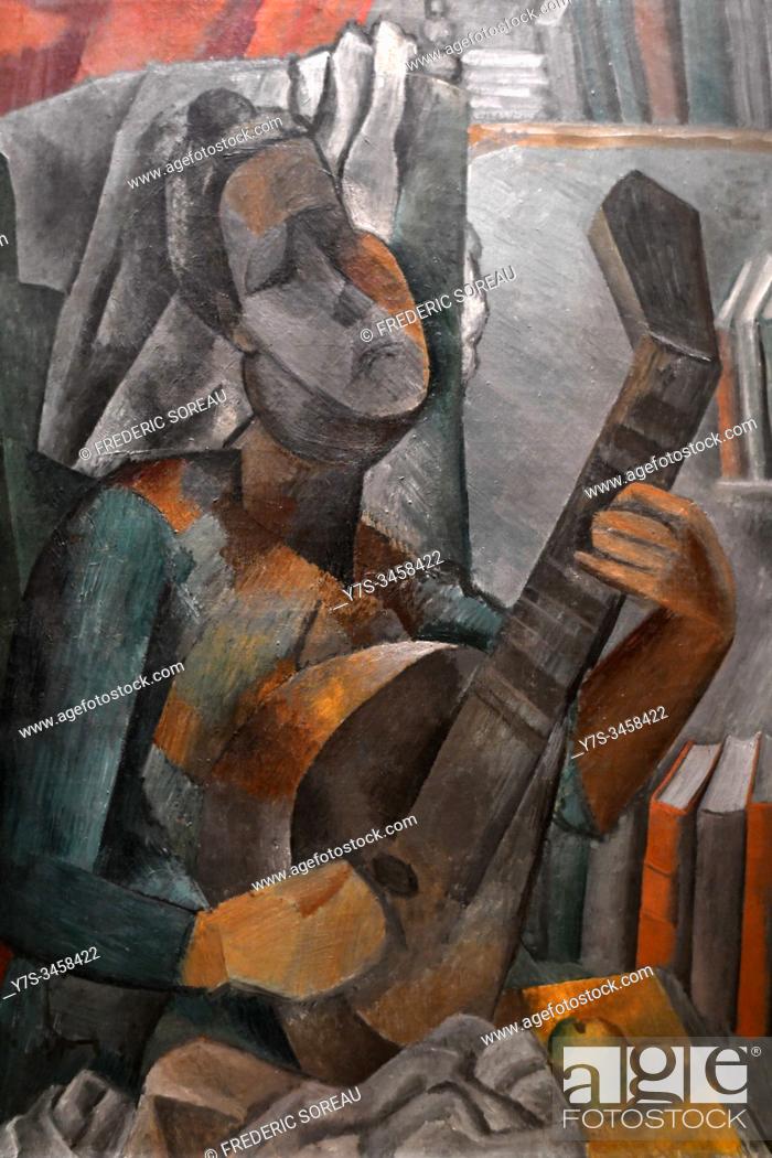 Stock Photo: Woman Playing a mandolin, 1909, by Pablo Picasso, State Hermitage museum, St Petersburg Russia, Europe.