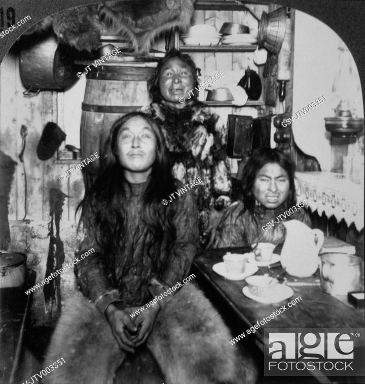 Stock Photo: Eskimo Family in Home, Portait, Fort Magnesia, Cape Sabine, Ellsmere Island, Canada, circa 1900.