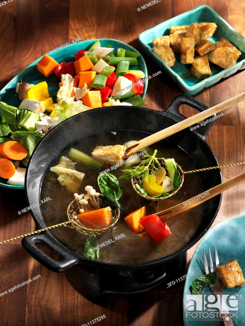 voertuig Op tijd terugvallen Chinese fondue with vegetables, Stock Photo, Picture And Rights Managed  Image. Pic. SFD-11375295 | agefotostock