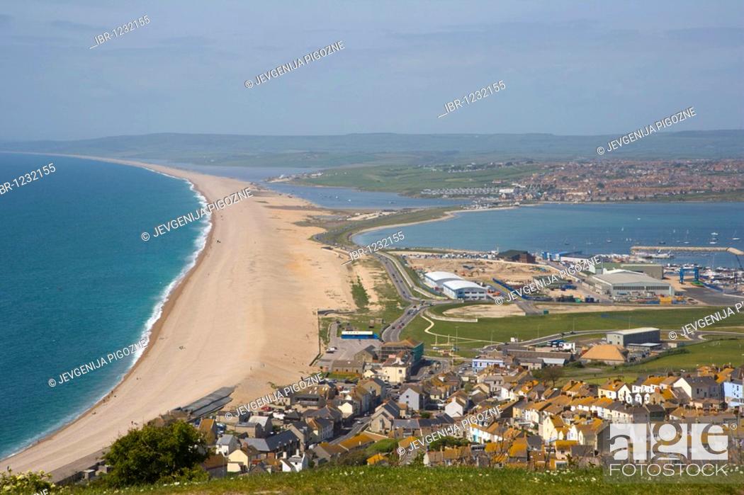 Stock Photo: Chesil beach, Fleet lagoon and Portland harbour looking north from Portland Heights, Dorset, England, United Kingdom, Europe.