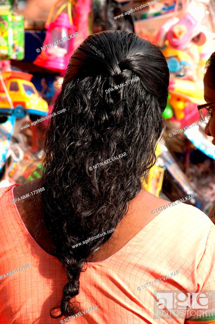 Black hair tied typical hairstyle of Malayalam woman ; Kollam ; Kerala ;  India 2010, Stock Photo, Picture And Rights Managed Image. Pic.  DPA-NMK-173988 | agefotostock