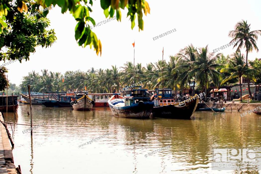 Stock Photo: small dirty river with boats and bridges in Asia nice view.