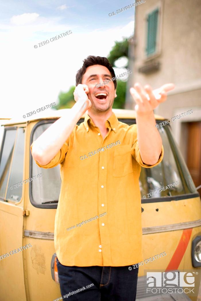 Man having a funny phone call, Stock Photo, Picture And Royalty Free Image.  Pic. CUL-23AVR0148RMG | agefotostock