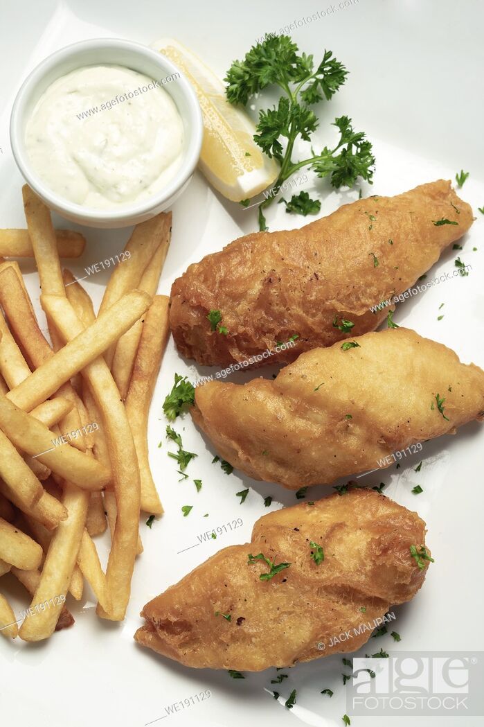 Stock Photo: british traditional fish and chips meal on white plate.