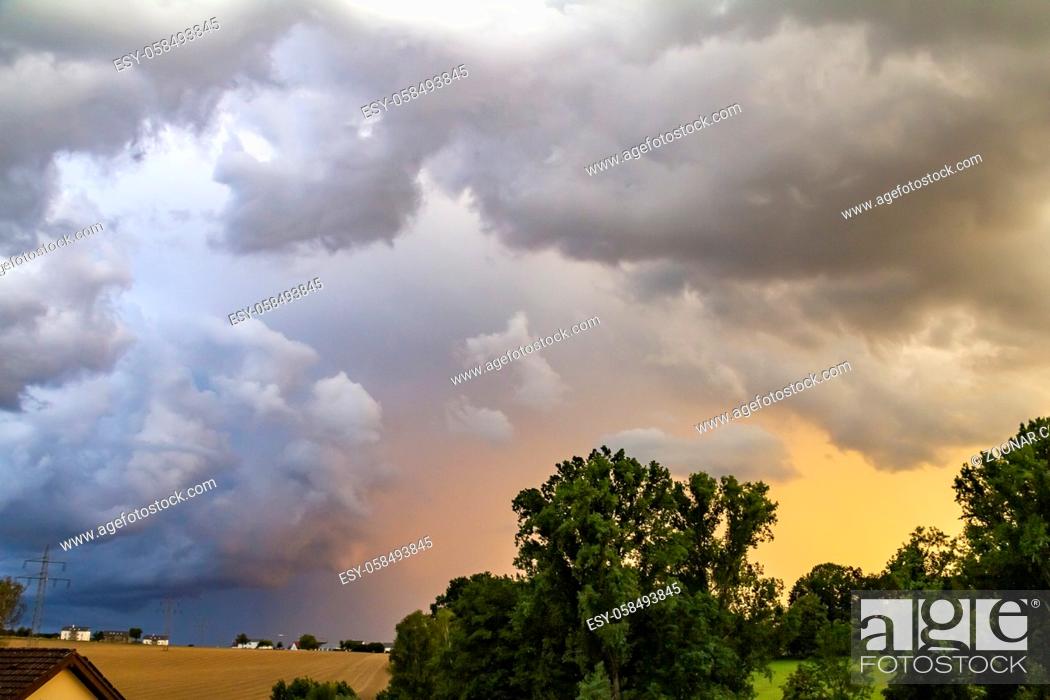 Stock Photo: stormy rural scenery at evening time in Southern Germany.