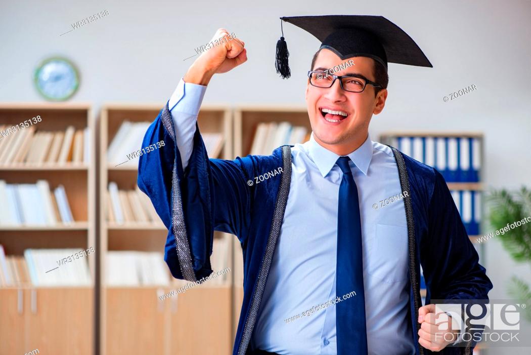 Stock Photo: Young man graduating from university.