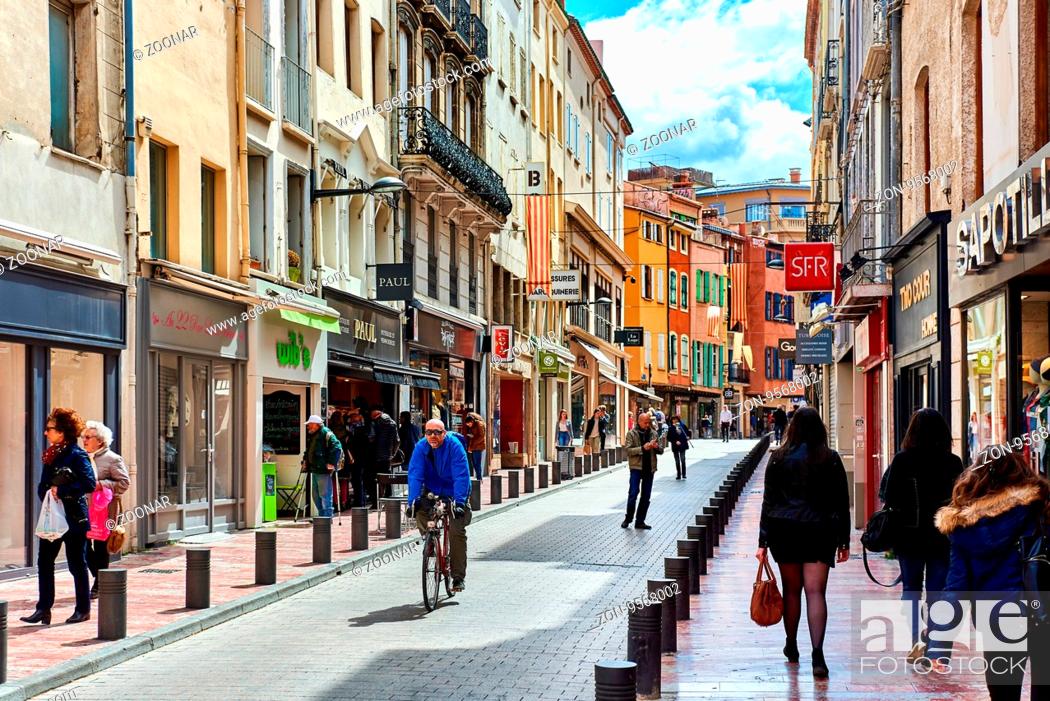 Perpignan, France - April 8, People walking in the Perpignan main commercial street in the old..., Stock Photo, Picture Rights Managed Image. Pic. ZON-9568002 | agefotostock