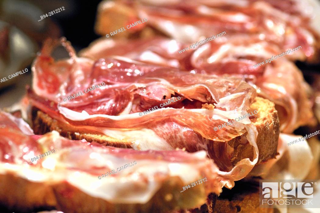 Stock Photo: Ham with bread. Pintxos or Tapas. Food very Typical in the Basque country. Spain.