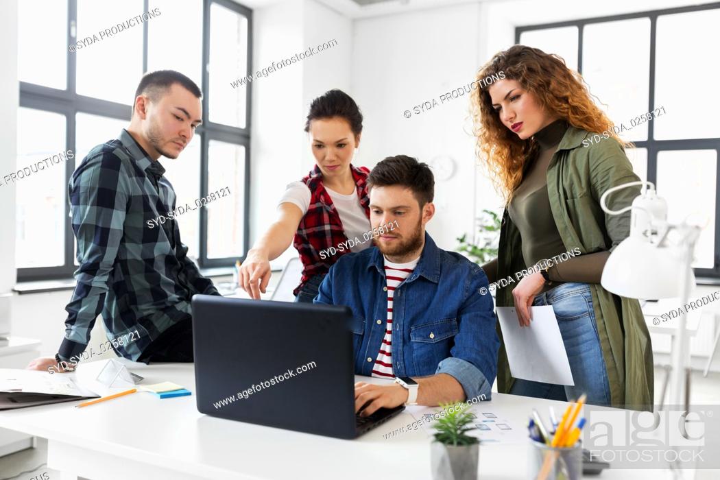 Stock Photo: creative team working on user interface at office.