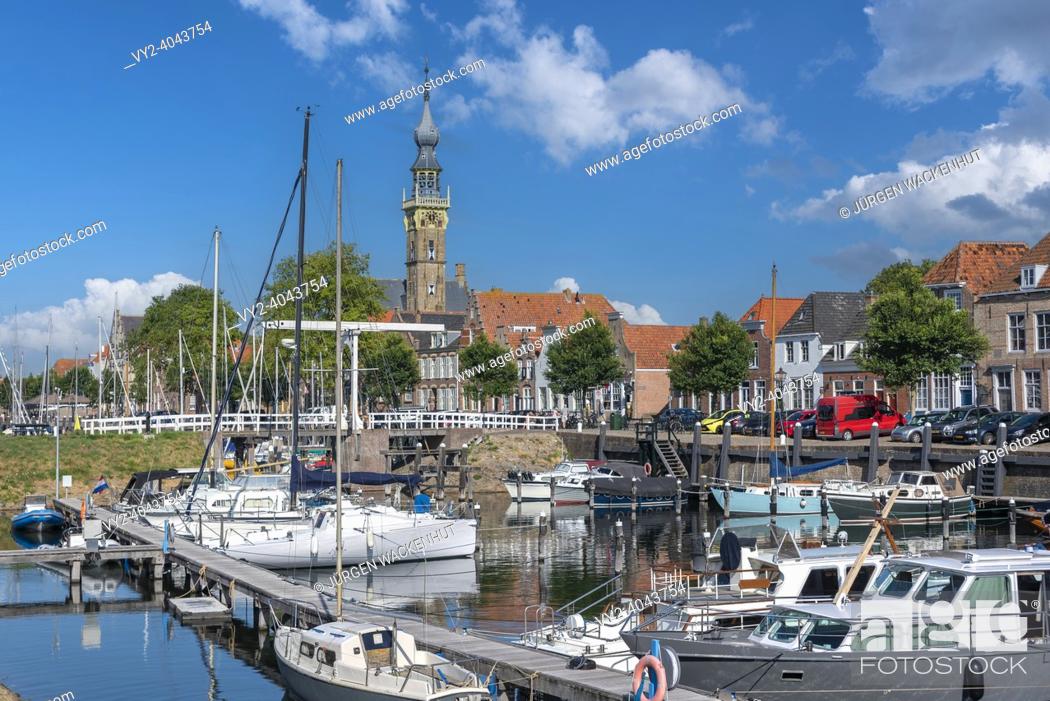 Stock Photo: Marina, in the background the historic town hall, Veere, Zeeland, Netherlands, Europe | Veere marina, in the background the historic town hall.